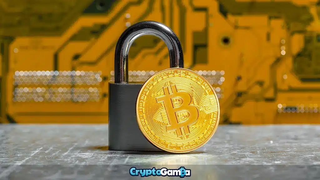 Golden bitcoin coin with padlock